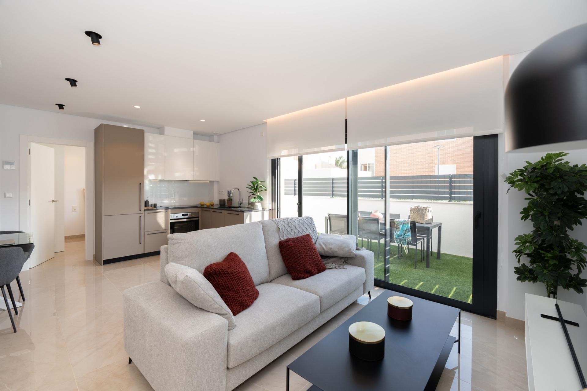 Nieuwbouwwoningen: rijtjeshuizen en vierplexwoningen in Gran Alacant, vlak bij het strand — photograph 6